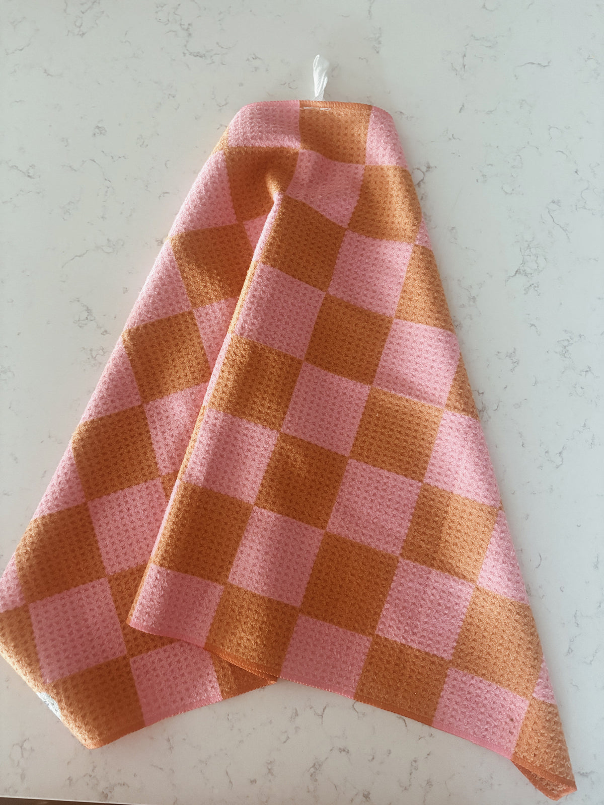 Pink + orange checkered kitchen towel
